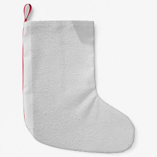 White concrete wall small christmas stocking