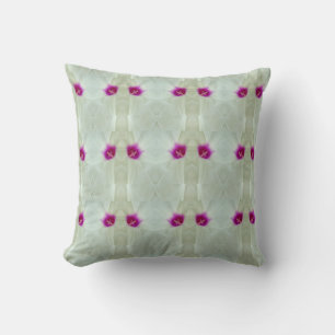 white, cream  background with hot pink pattern cushion