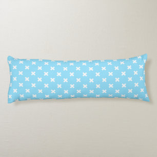 White cross stitches on baby blue body cushion