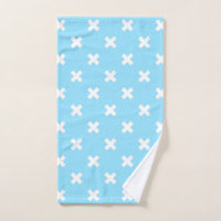 White cross stitches on baby blue