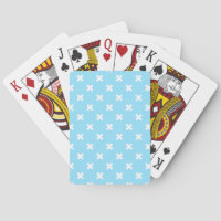 White cross stitches on baby blue