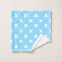 White cross stitches on baby blue