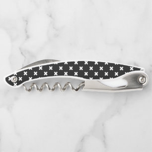White cross stitches on black corkscrew
