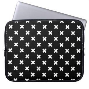 White cross stitches on black laptop sleeve