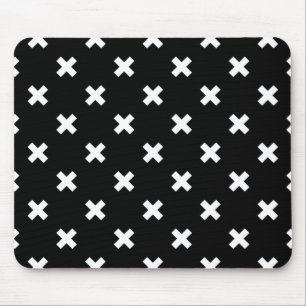 White cross stitches on black mouse mat