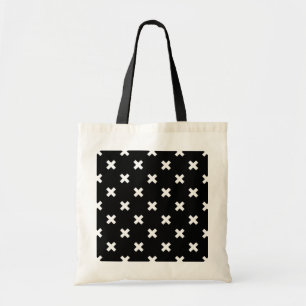 White cross stitches on black tote bag