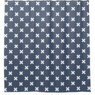 White cross stitches on blue-grey shower curtain