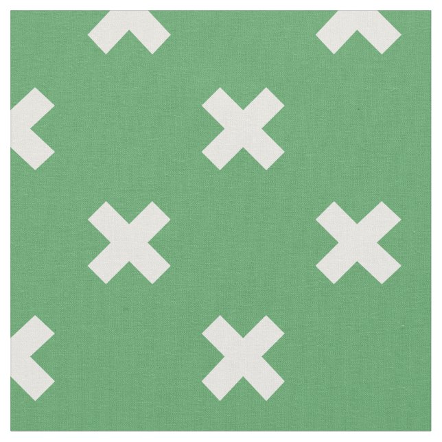 White cross stitches on green fabric (Close Up)