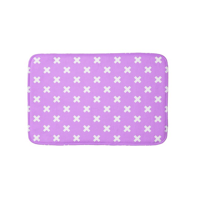White cross stitches on lilac bath mat (Front)
