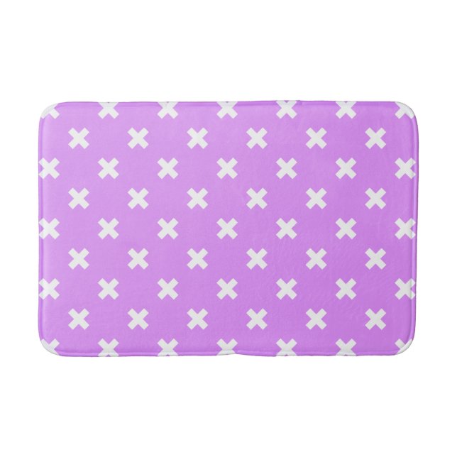 White cross stitches on lilac bath mat (Front)