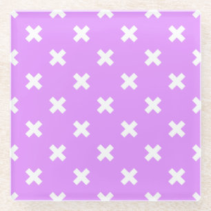 White cross stitches on lilac glass coaster