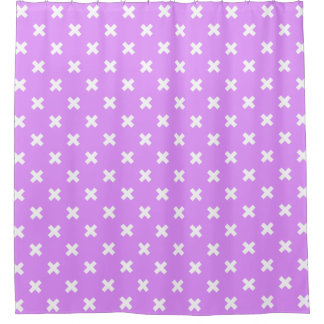 White cross stitches on lilac shower curtain