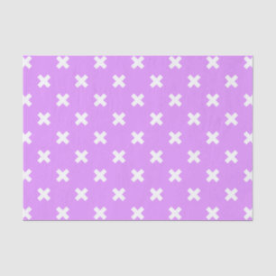 White cross stitches on lilac tissue paper