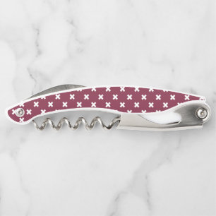 White cross stitches on mulberry corkscrew