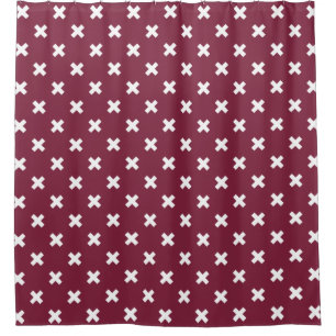 White cross stitches on mulberry shower curtain