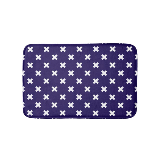 White cross stitches on navy blue bath mat (Front)