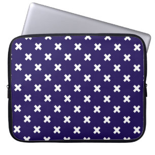 White cross stitches on navy blue laptop sleeve