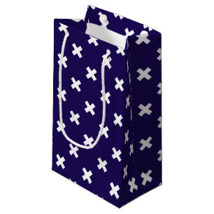 White cross stitches on navy blue small gift bag