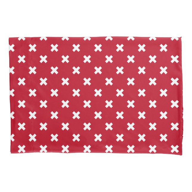 White cross stitches on red pillowcase (Front)
