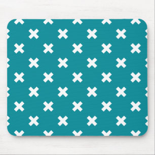 White cross stitches on teal mouse mat