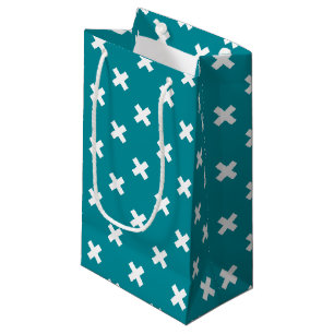 White cross stitches on teal small gift bag