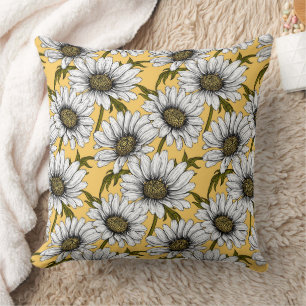White daisies, wild flowers on yellow cushion