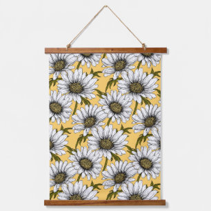 White daisies, wild flowers on yellow hanging tapestry