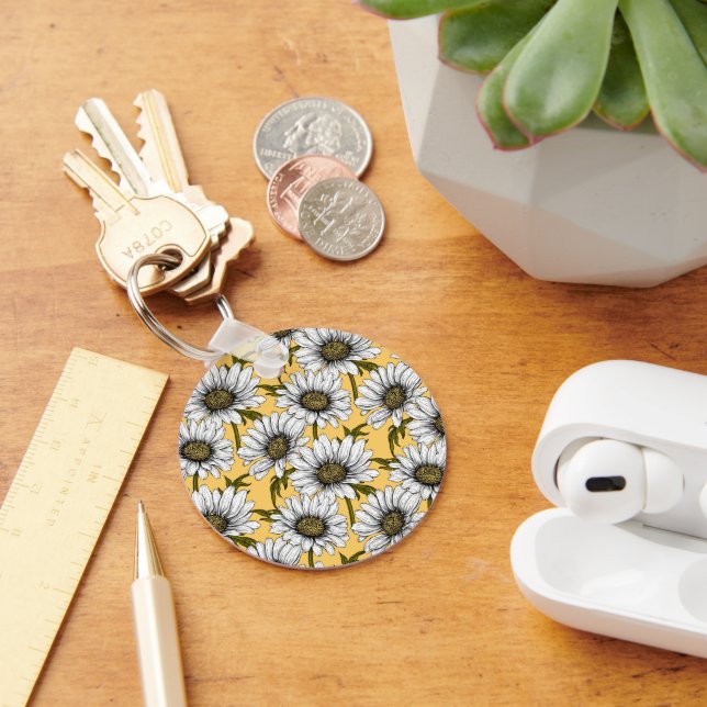 White daisies, wild flowers on yellow key ring (Desk)