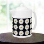 White Daisy Floral Pattern on Black<br><div class="desc">White ceramic teapot with lid that features the photo image of a pretty,  white Daisy flower on a black background and printed in a repeating pattern. A lovely,  floral design!</div>