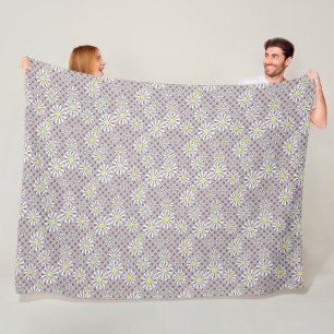 White daisy flowers on a beige brown polka dot fleece blanket