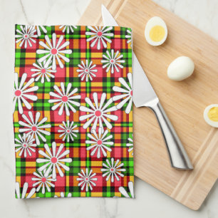 White daisy flowers on a red green chequered backg tea towel