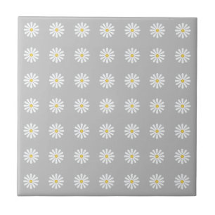 White daisy flowers, yellow centre on silver tile