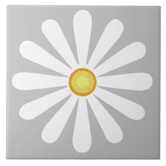 White daisy with yellow centre on silver tile