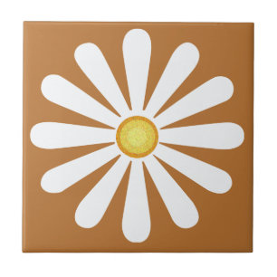 White daisy, yellow centre, on copper tile