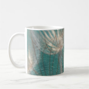 White dandelion in close up photography coffee mug