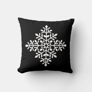 White Decorative Snowflake Silhouette On Black Cushion