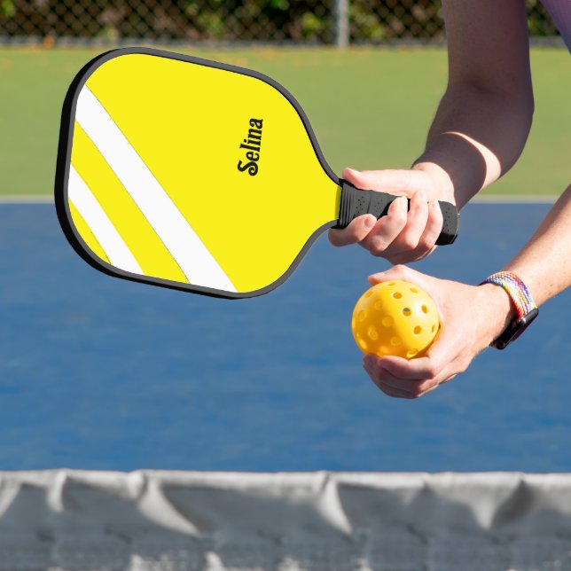 White diagonal stripes on yellow pickleball paddle (Insitu)