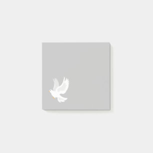 White dove bird on grey post-it notes