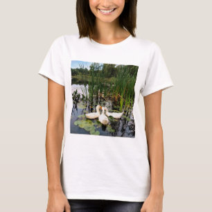 White ducks, lily pads, cattails, lake shore T-Shirt