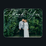 White Elegant Handwritten Script Photo Wedding Magnet<br><div class="desc">Celebrate your love and show gratitude with our customisable photo wedding thank you magnet! This unique keepsake is perfect for reminding your loved ones of your special day while expressing your heartfelt thanks in a memorable way. It features an elegant white script. Personalise by adding your photo and details. This...</div>