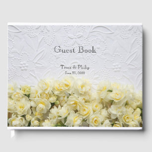 White embossed-look with yellow narcissus guest book