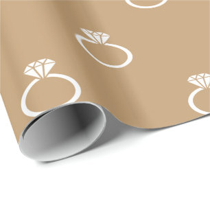 White Engagement Rings on Camel Brown Wrapping Paper