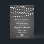 White Fairy Lights Faux Chalkboard Wedding Save The Date<br><div class="desc">Set the perfect mood for your wedding with this charming Save the Date card, featuring whimsical string lights against a rustic faux chalkboard background. This design combines a cosy, vintage feel with modern elegance, making it a perfect choice for couples planning a rustic, vintage, or outdoor wedding. Whether you're hosting...</div>