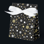 White Faux Gold Snowflakes Polkadots On Black Favour Box<br><div class="desc">Contemporary white and gold looking snowflakes and polka dots pattern on a black background. Modern but simple plain whimsical design for wrapping those fun birthday,  surprise,  or Christmas presents with. Available on products such as wrapping and tissue paper,  gift tags,  bags and favour boxes,  stickers and ribbons</div>