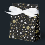 White Faux Gold Snowflakes Polkadots On Black Favour Box<br><div class="desc">Contemporary white and gold looking snowflakes and polka dots pattern on a black background. Modern but simple plain whimsical design for wrapping those fun birthday,  surprise,  or Christmas presents with. Available on products such as wrapping and tissue paper,  gift tags,  bags and favour boxes,  stickers and ribbons</div>
