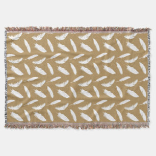 White feather print on camel tan throw blanket