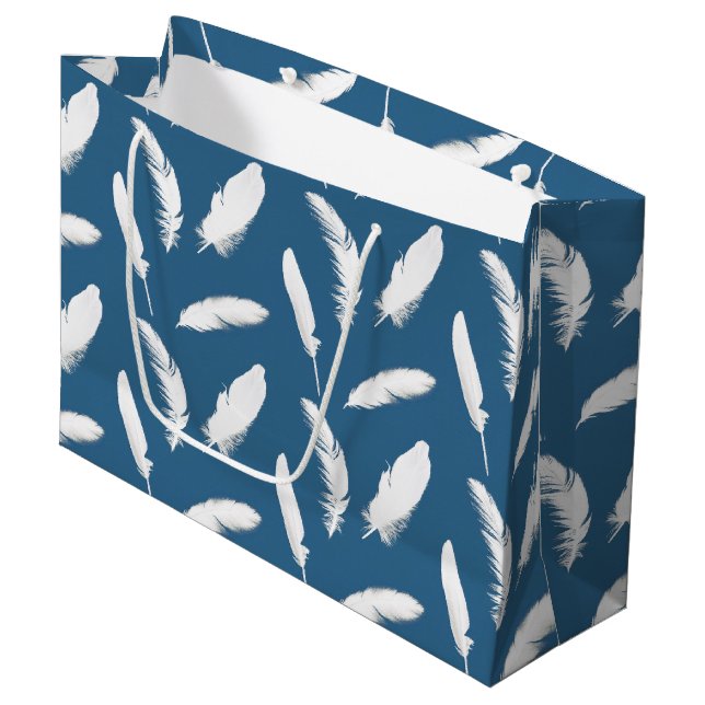 White feather print on denim blue large gift bag (Front Angled)
