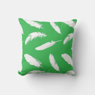 White feather print on jade green cushion