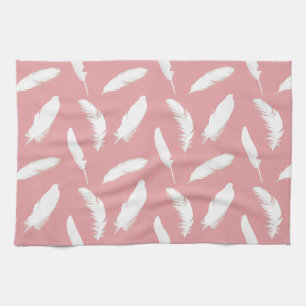 White feather print on shell pink tea towel