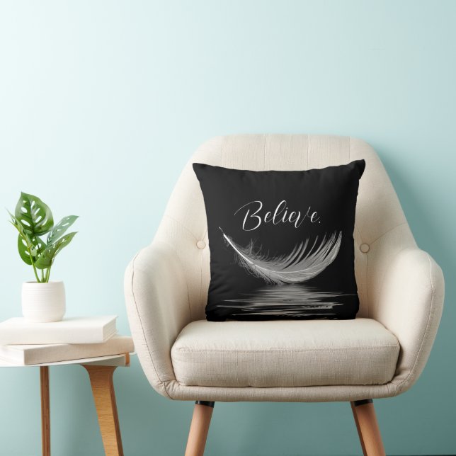 White Feather Reflection on Black Cushion (Chair)